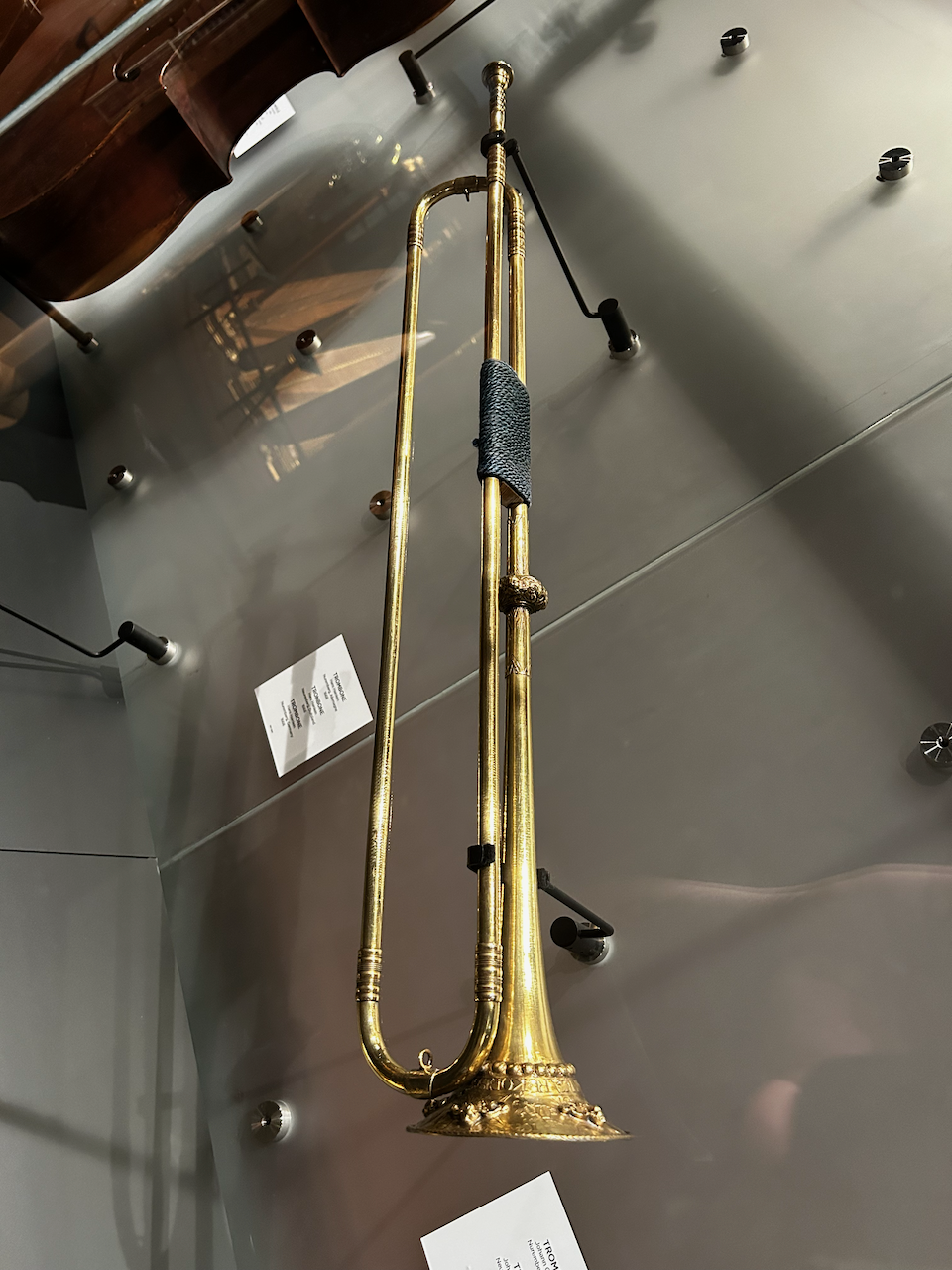 Photograph of (a) brass instrument(s) from the Musical Instruments Museum in Brussels, Belgium