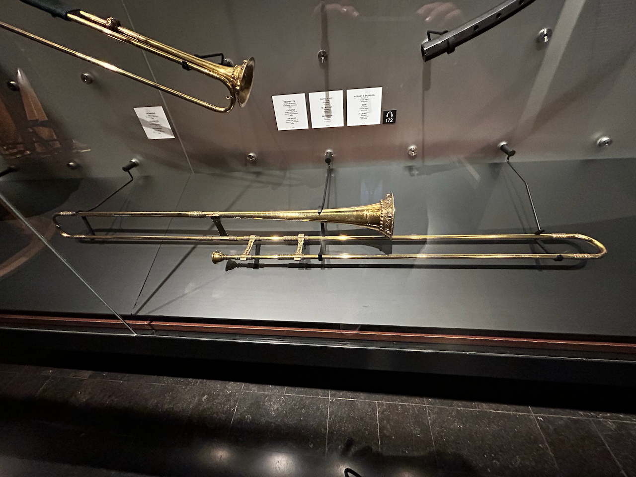 Photograph of (a) brass instrument(s) from the Musical Instruments Museum in Brussels, Belgium