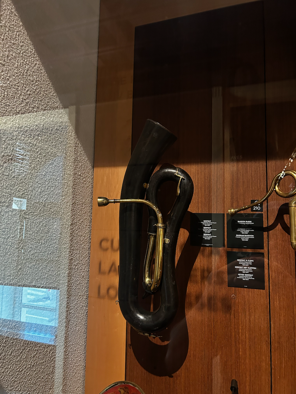 Photograph of (a) brass instrument(s) from the Musical Instruments Museum in Brussels, Belgium