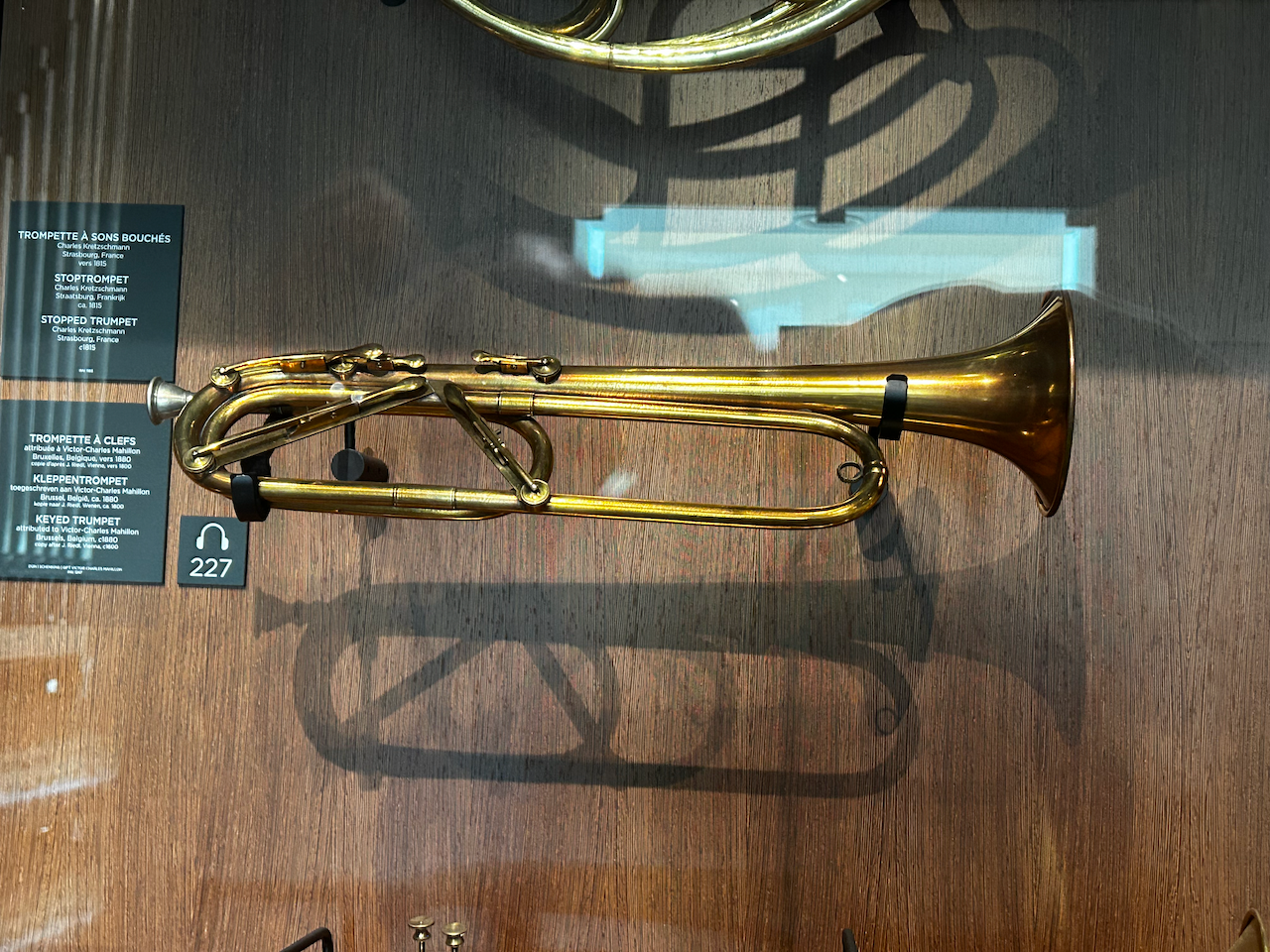 Photograph of (a) brass instrument(s) from the Musical Instruments Museum in Brussels, Belgium
