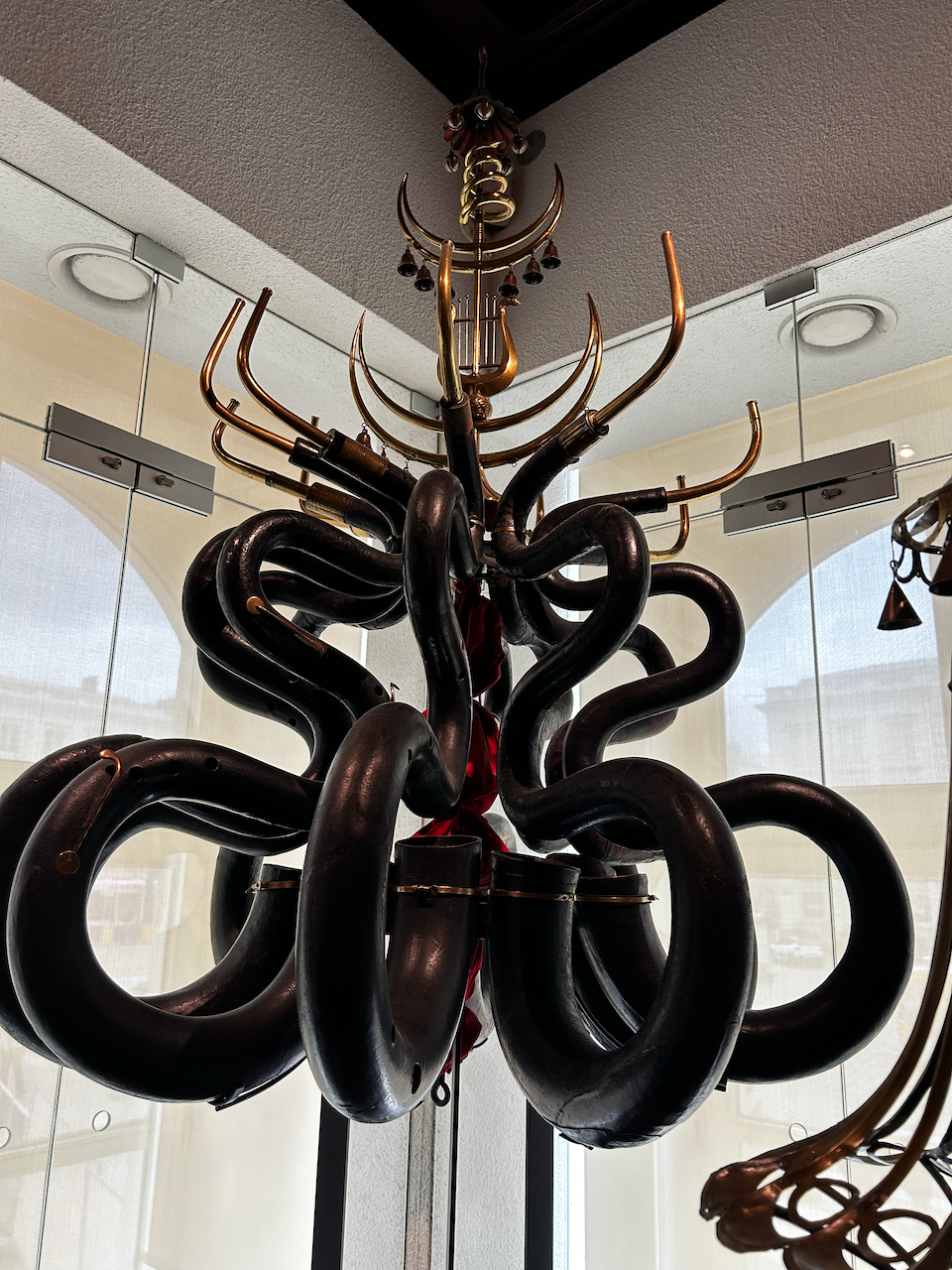 Photograph of (a) brass instrument(s) from the Musical Instruments Museum in Brussels, Belgium